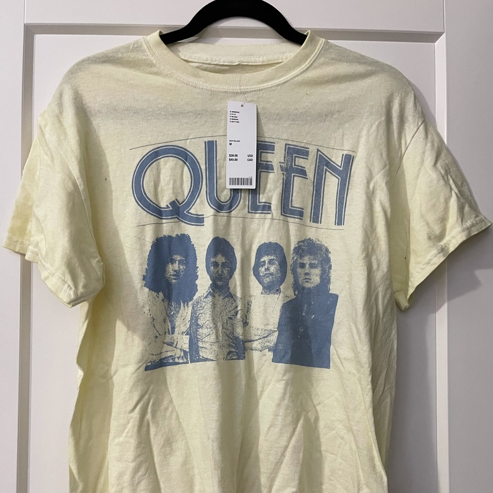 Light yellow (butter color) Urban Outfitters Queen tshirt. NWT